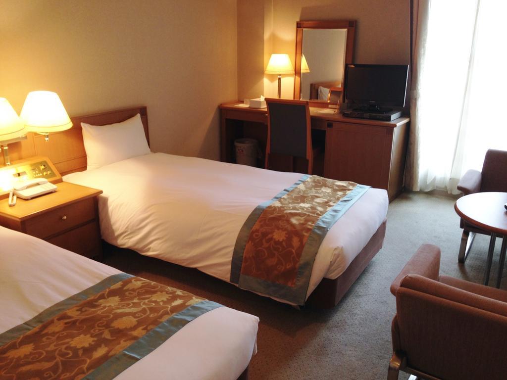 Hotel Sunplaza Seasons à Nagoya Extérieur photo