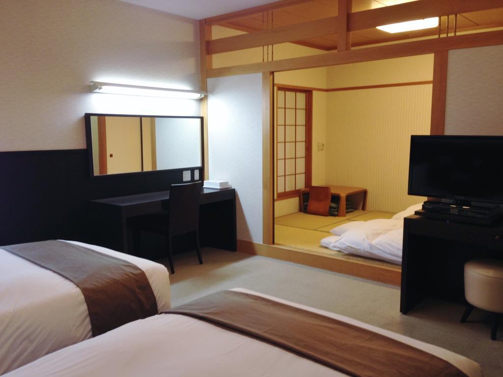 Hotel Sunplaza Seasons à Nagoya Extérieur photo